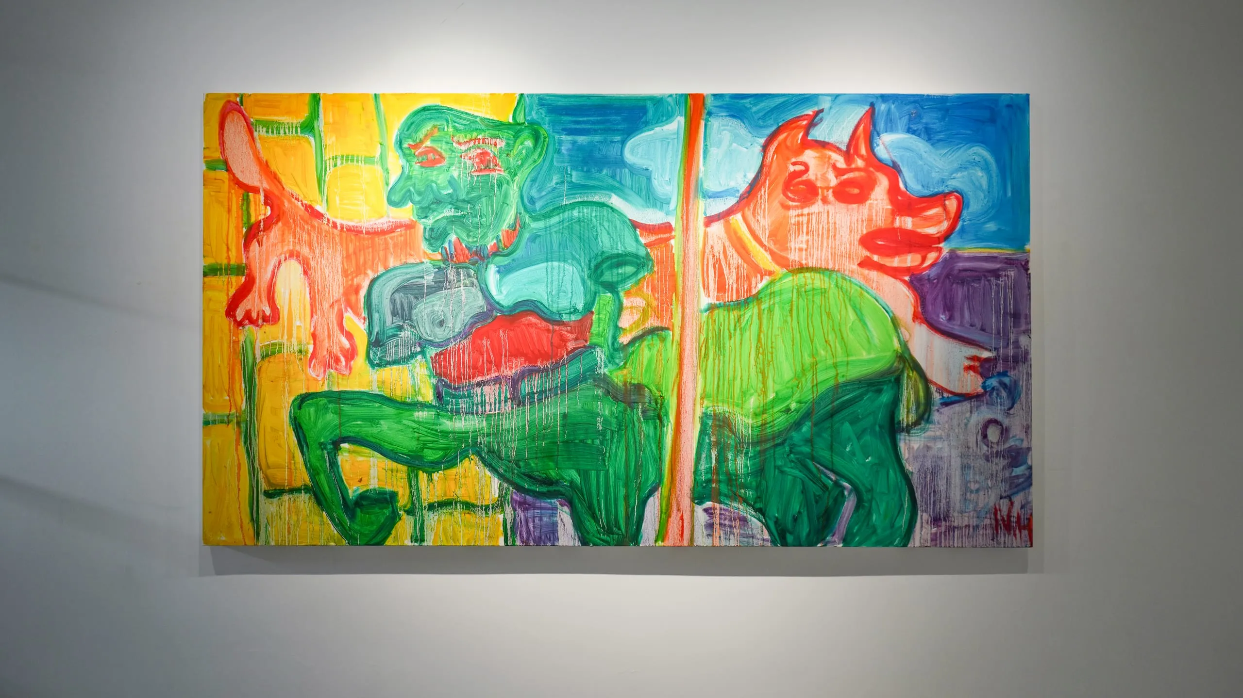 A green figure rides a red beast on a carousel pole against bands of yellow, blue and violet.